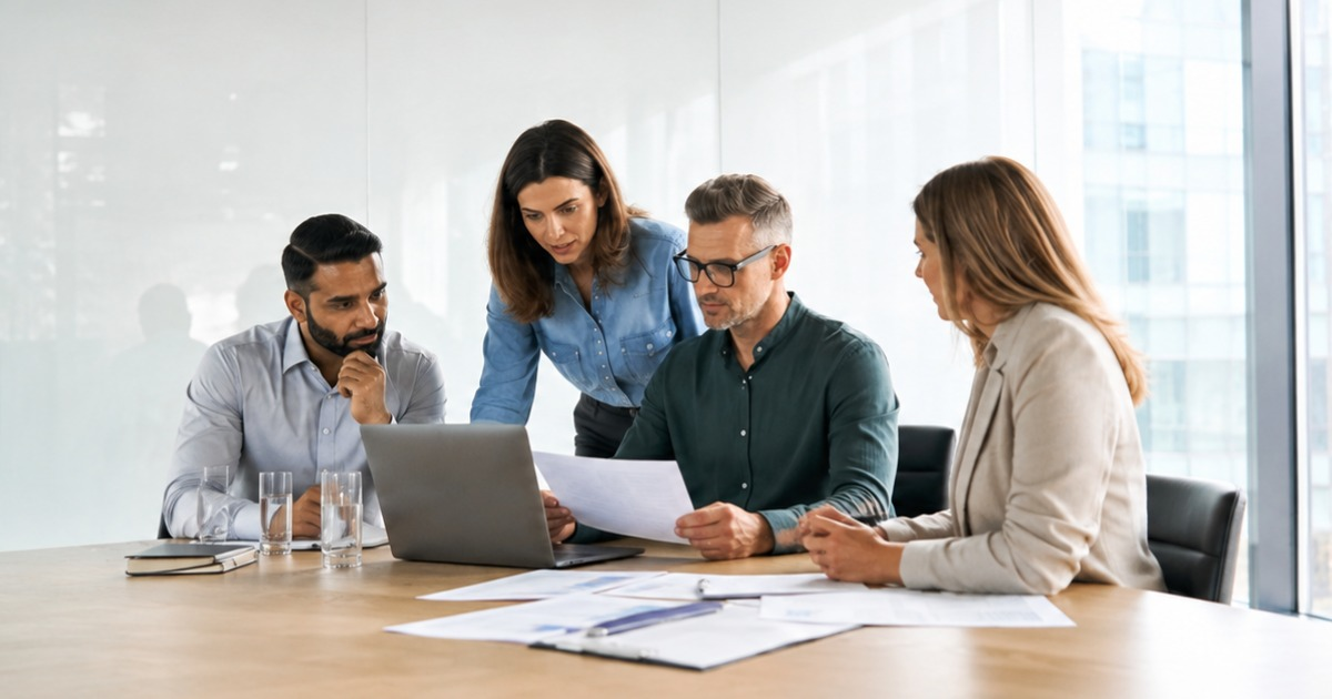 Connected Union Membership Management with PRIZM – JayStar Union staff reviewing membership operations and connected management software with JayStar PRIZM